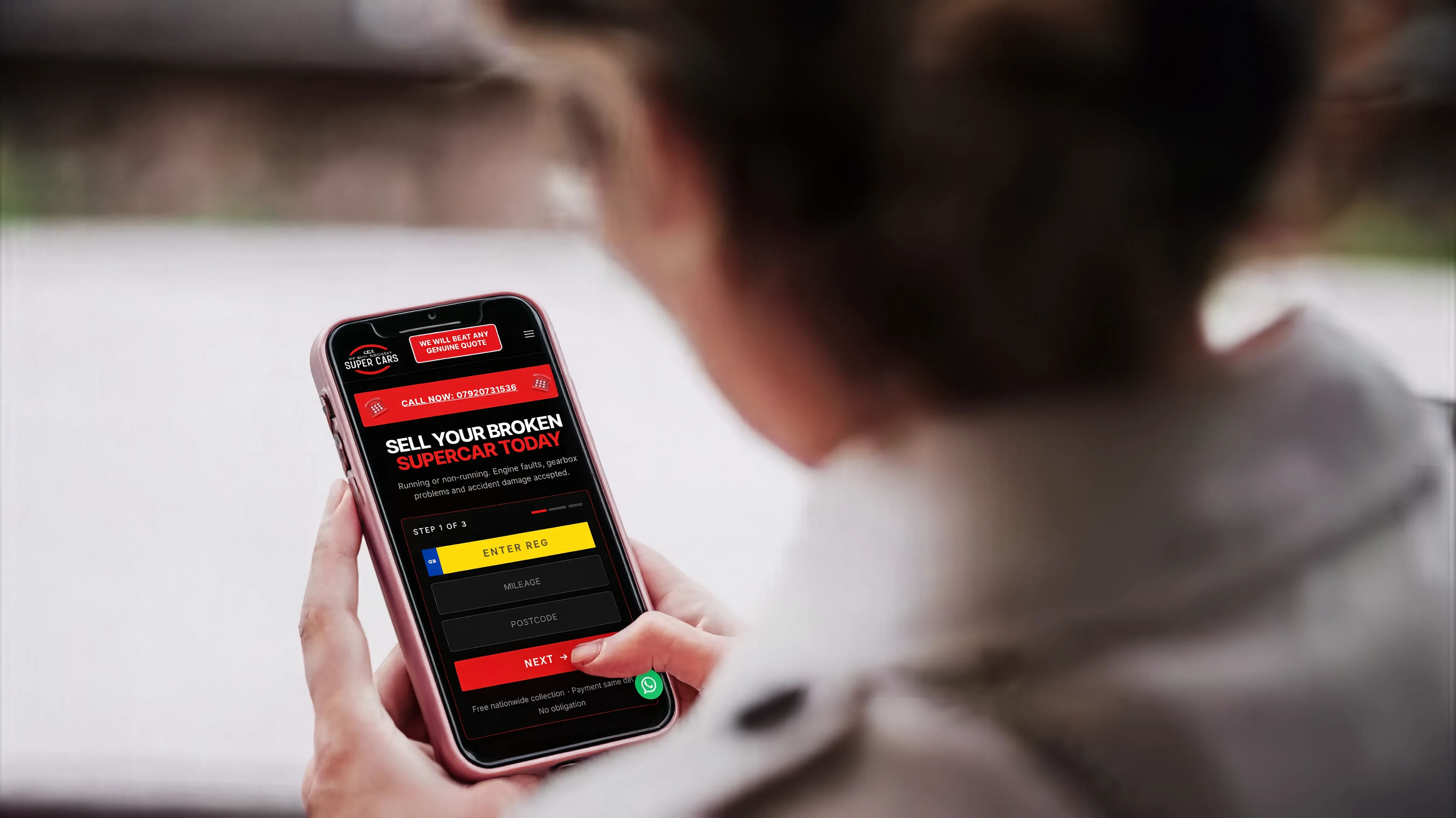 Person entering their supercar details on the We Buy Broken Supercars website on a phone